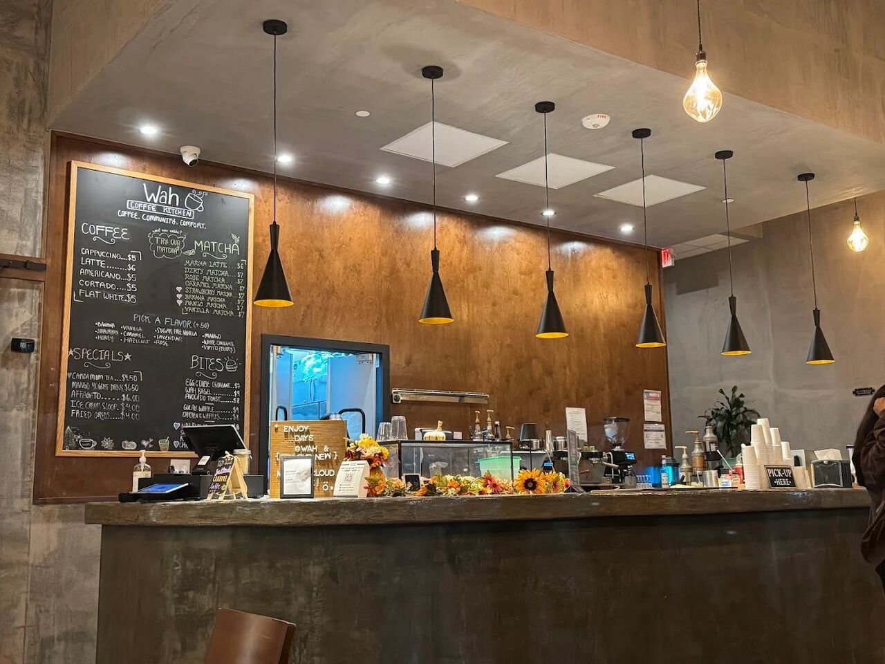 Wah Coffee bar in the evening with warm lighting