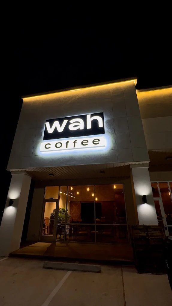 Wah coffee exterior signage lit up at night